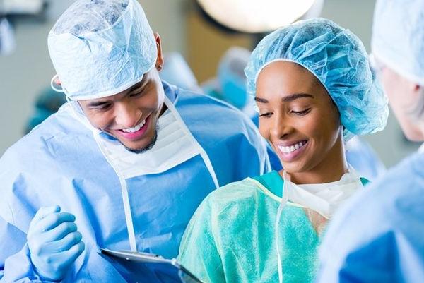 A surgical technologist assisting in the operating room